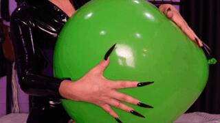 Playing with balloon in latex, riding it, and long nails scratching (wmv)
