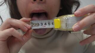 Indian stepsister measures the length and width of her tongue, then measures the width and length of her mouth with a centimeter