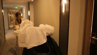 Chinese hotel cleaner's feet were licked and tickled?