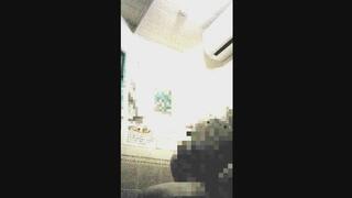 A blonde Japanese woman in cosplay gives a handjob to a masochistic man