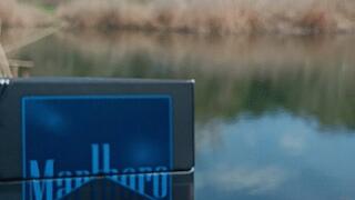 smoking and pop balloons on street