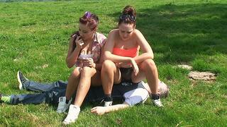 2 Girls Sitting On The Slave In A Field