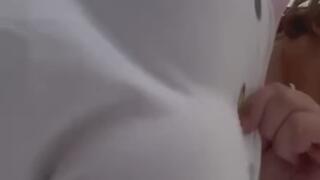 Playing with big saggy tits over camera