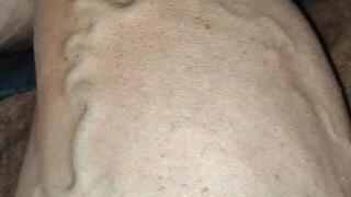 Up close flexing while watching tv