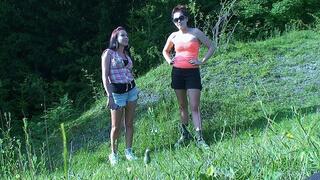 2 Girls Trampling Their Slave On a Hill