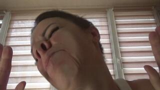 smeared face in glass