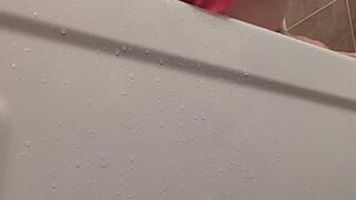 Pawg sucks and rides pink dildo in the shower