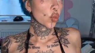 Tattooed blue haired slut fucks sex machine