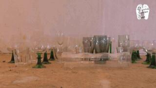 Drinking Glasses under metal heel Pumps floor view