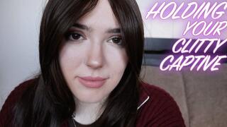 HOLDING YOUR CLITTY CAPTIVE