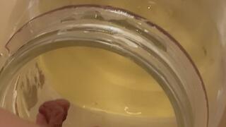 Golden Shower - pissing into a jar copy