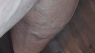 Tempest's bare toes in gold heels