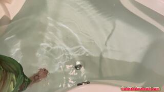 Carissa in the garden tub with gas mask—return to bathtub chronicles!