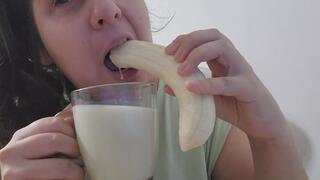 EATING A BANANA AND DRINKING MILK