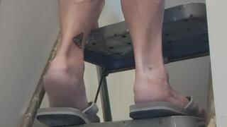 Tempest using step latter to put up sign