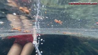 Carissa snorkeling in her Christmas outfit in a spring part 1