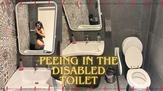 Peeing in the disabled toilet