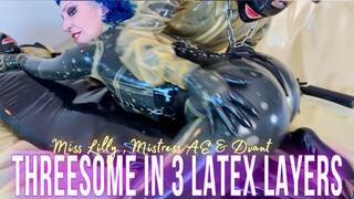 Miss Lilly and Mistress AE Have A Threesome With Their Rubber Toy In Three Layers Of Latex