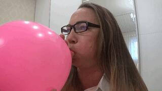 Inflating a large balloon until it explodes c