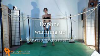 Daphne warming up karate and kung fu style