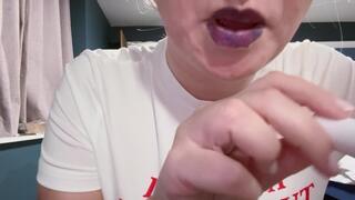 MOUTH AND LIPS FULL OF CHOCOLATE