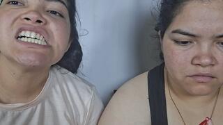 Two silly girls show their foolish faces