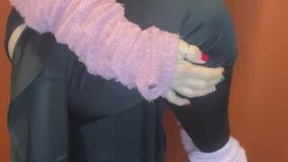 Removal of workout clothing: a strip tease in pink and black.