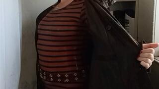 Soaking wet in a jacket and dress