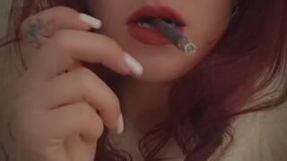 Clouds of smoke come out from my mouth and cream from my pussy