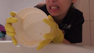 My Indian stepsister doesn't like washing dishes but someone has to do it so she washes the dishes in a yellow dishwashing glove