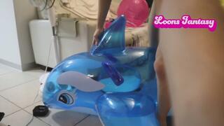 Owllete bounces on inflatable dolphin and bites it to pop it copy