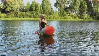 Alla hotly fucks a big inflatable rocket on the lake