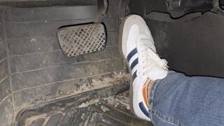 Revving and playing with the car while waiting.