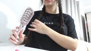 My stepsister combs her hair and does her makeup