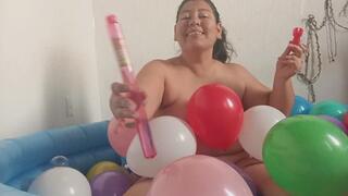 Naked Bubble Blowing in a Pool Full of Balloons