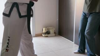 Standing ballbusting kicks to student