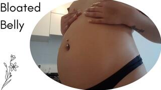 My swollen belly expanding more and more
