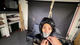 Rey bound and gagged in a shiny Downjacket and Leatherpants