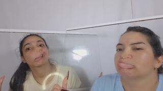 Distorted face in duo against the glass