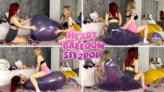 Sabina and Chloe Sit2Pop a Heart Balloon