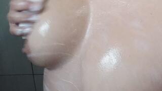 washing breasts in the shower