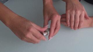 videos of women rubbing lotion on their hands a
