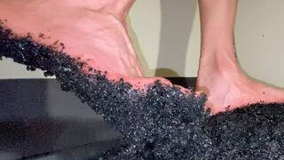 Sticky tar stuck to bare feet