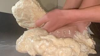 Bare feet trapped in hardened expanding foam