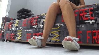 Wiggling my toes in fur slippers c