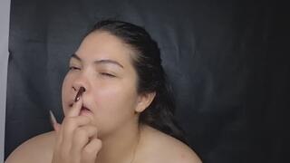 Picking my nose with my long nails