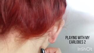 Playing with my earlobes 2
