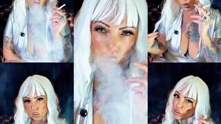 Intergalactic smoker straight from Planet Nicon in silver leather - Dunhill Menthol 100