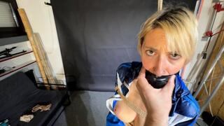 Myxxxy bound and gagged in shiny nylon Shorts and a Windbreaker