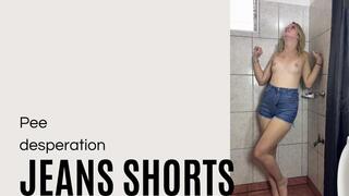 pee desperation in jeans shorts